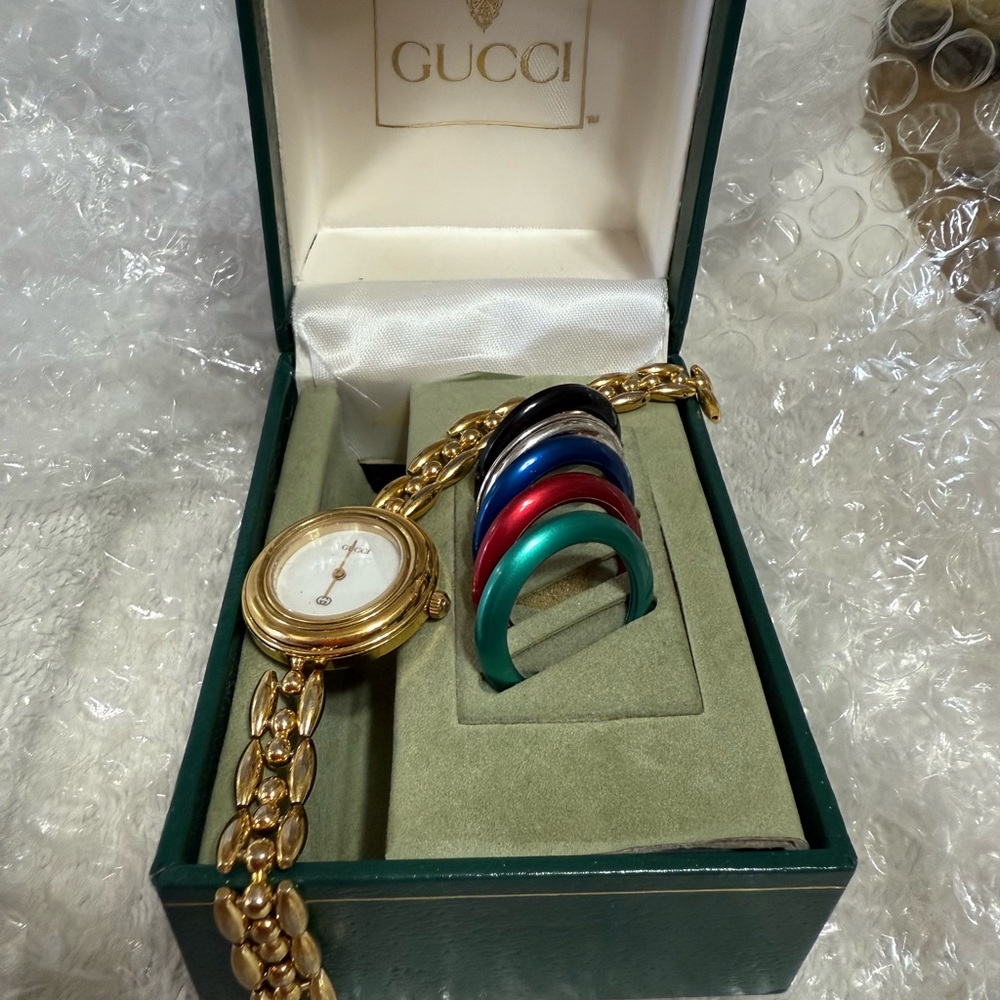 Gucci Gold tone Watch with Interchangeable Bezels